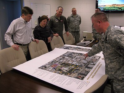 Virginia National Guardmembers brief Gov. Bob McDonnell in Sandston, Va., on winter storm response operations throughout the commonwealth Jan. 30, 2010. The governor received the briefing after severe winter weather dumped up to 14 inches of snow in areas across the commonwealth, creating a state of emergency which called out the Guard to assist civilian responders.