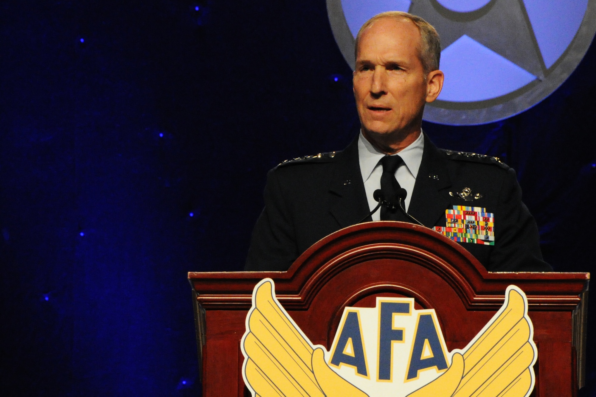 Gen. Michael Hostage speaks to the audience on the importance of maintaining combat capabilities with minimal resources during the Air Force Association's 2014 Air and Space Conference Sep. 16, 2014, in Washington, D.C. Hostage is responsible for organizing, training and equipping combat-ready Airmen for peacetime and wartime defense. Hostage is the commander of Air Combat Command. (U.S. Air Force photo/Staff Sgt. Matt Davis)