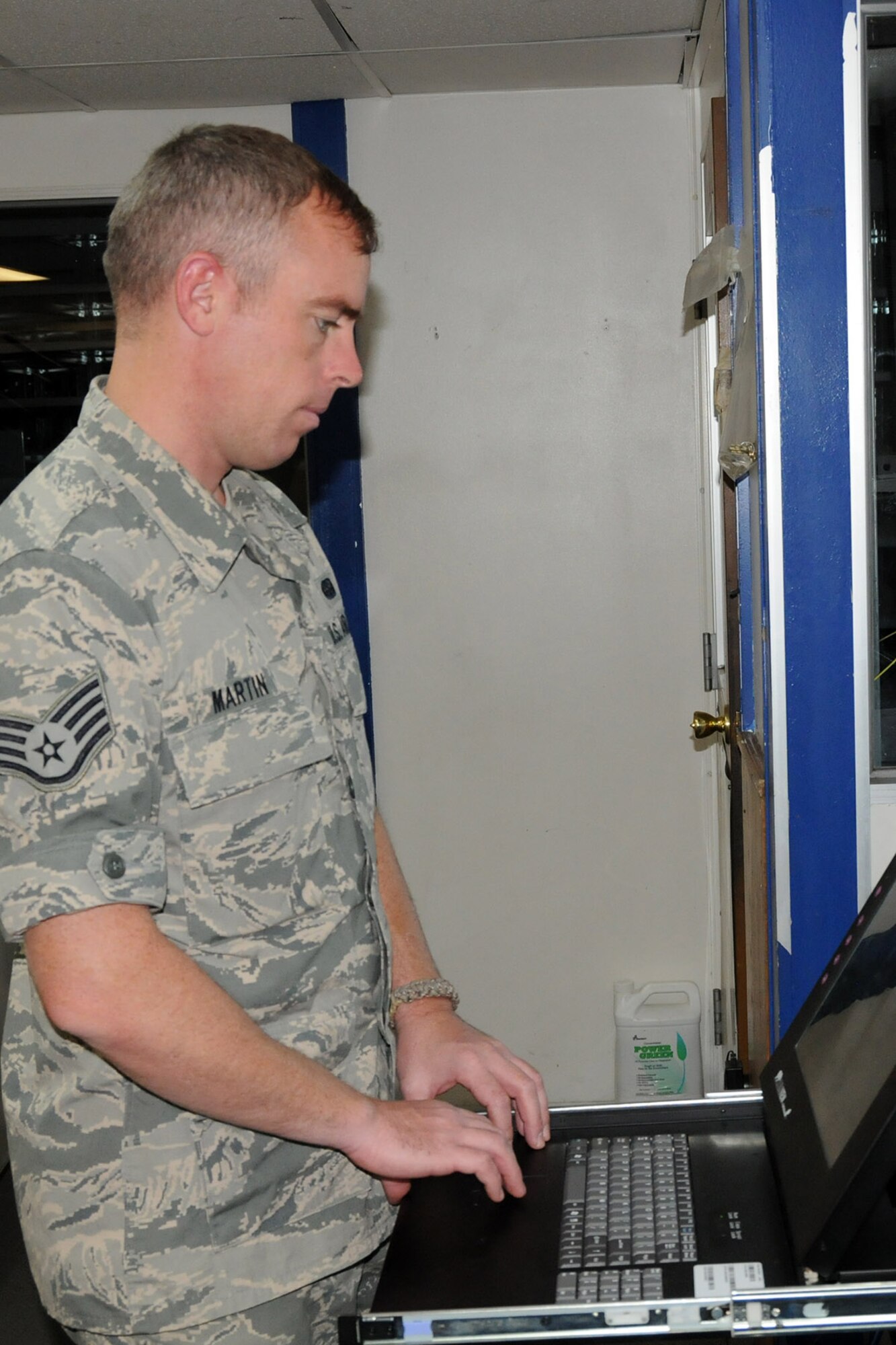 Air Force Reserve Staff Sgt. Gil Martin, a Cyber Transport Systems Technician assigned to the 910th Communications Squadron (CS), works on the Joint Incident Site Communications Capability (JISCC) satellite system in the 910th CS work center here, Sept. 16, 2014. A five-person 910th CS team is providing support to the two-week mission through a wide variety of technologies designed to keep all of the 910th’s Citizen Airmen in touch with each other and their home base of Youngstown Air Reserve Station, Ohio while performing their duty in Idaho. The 910th Airlift Wing, based at Youngstown Air Reserve Station, Ohio, is home to the Department of Defense’s only large-area, fixed-wing aerial spray capability. U.S. Air Force photo by Tech. Sgt. Rick Lisum