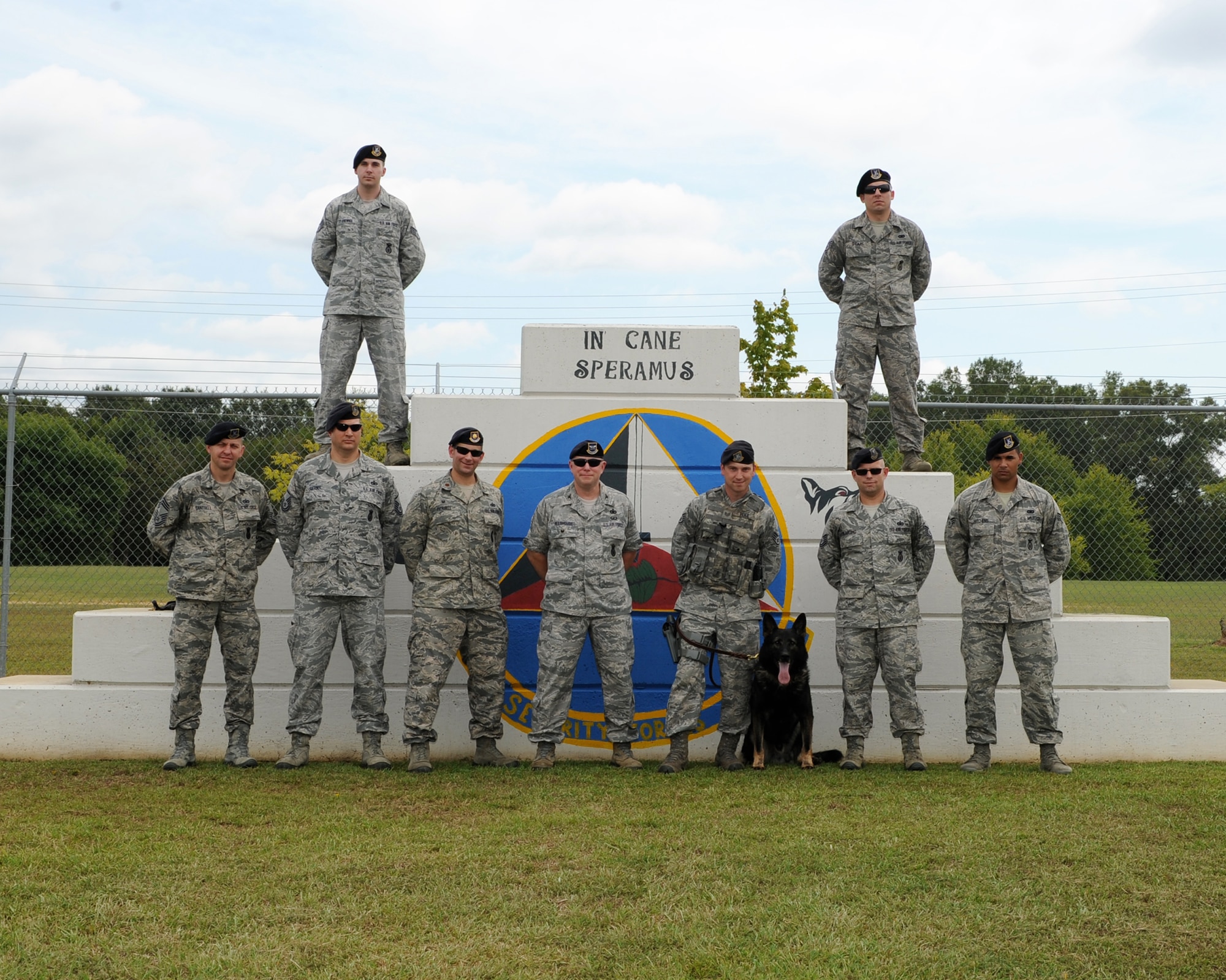 Col. Michael Allshouse, Air Education and Training Command A7S Chief of

Security Forces, and Master Sgt. Jason Seibel, A7S Command Integrated

Defense Manager, pose for a photo with Columbus Air Force Base defenders

Sept. 9 at the Military Working Dog kennel. Allshouse and Seibel spent two

days speaking with Airmen and getting to know Columbus AFB. (U.S. Air Force

photo/Elizabeth Owens)
