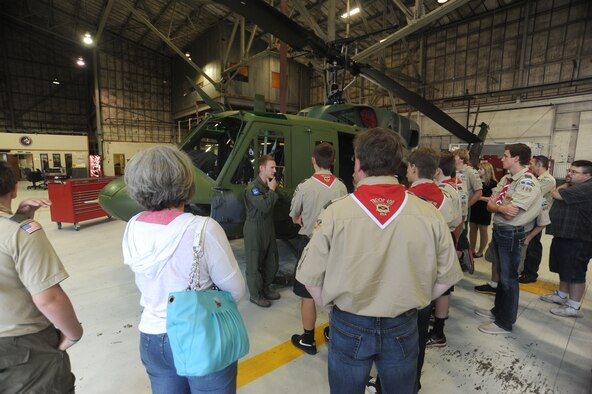 Boy Scouts from Troop 400 get a close-up look at a helicopter of the 36th Rescue Flight at Fairchild Air Force Base, Washington, Sept. 15, 2014. The scouts were treated to tours of both a KC-135 Stratotanker and a UH-1N Iroquois helicopter. (U.S. Air Force photo/Airman 1st Class Sam Fogleman)