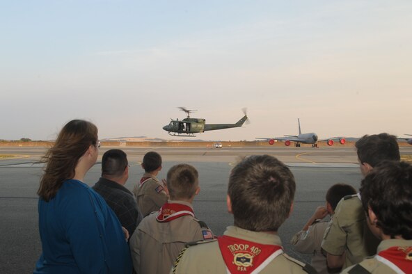 Boy Scouts from Troop 400 watch a helicopter from the 36th Rescue Flight take off at Fairchild Air Force Base, Washington, Sept. 15, 2014. The scouts were able to view a variety of aircraft during their tour of the base. (U.S. Air Force photo/Airman 1st Class Sam Fogleman_