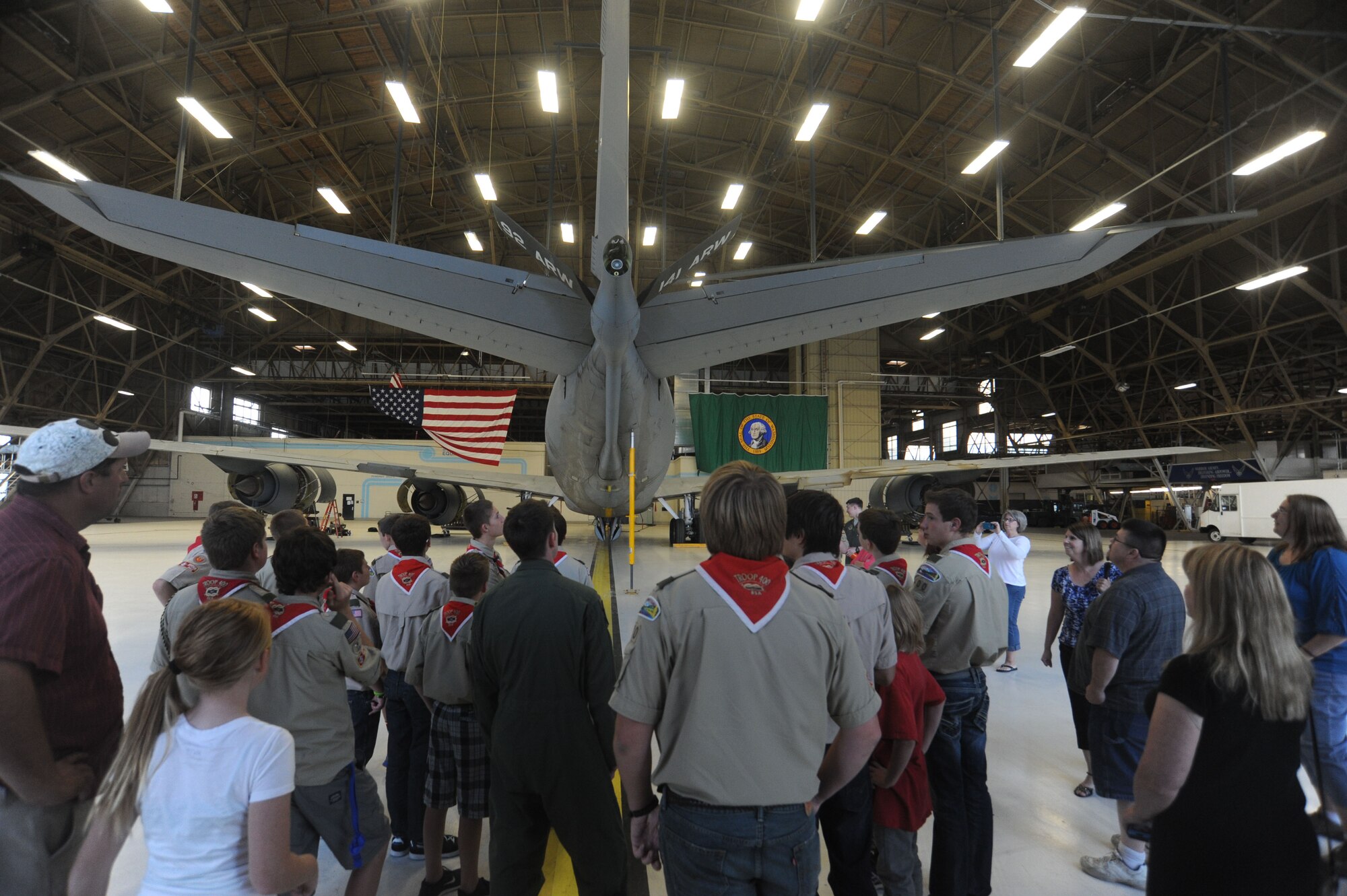 Boy Scouts from Troop 400 take a look at a KC-135 Stratotanker with the help of Airmen at Fairchild Air Force Base, Washington, Sept. 15, 2014. The scouts toured the base to gain a greater understanding of Fairchild’s mission. (U.S. Air Force photo by Airman 1st Class Sam Fogleman/Released)