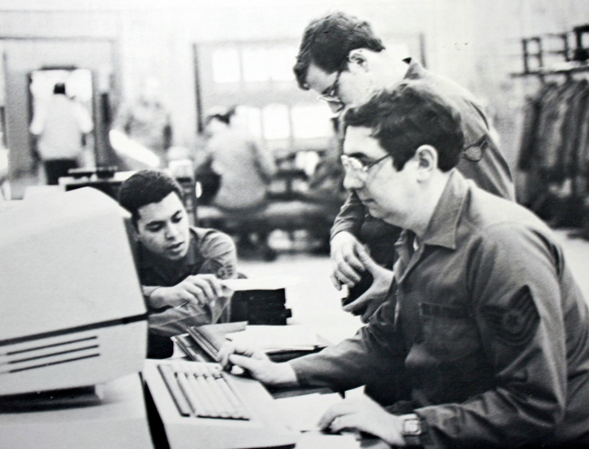 TRAVIS AIR FORCE BASE, Calif. -- Tech. Sgt. William T. Weeden, 349th Aircraft Maintenance Squadron works with this new computer system given to the 349th AMW in 1983. (U.S. Air Force file photo) 