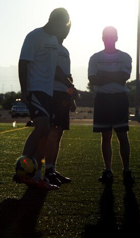 Members of the Nellis/Creech soccer team practice footwork during training at Nellis Air Force Base, Nev., Sept. 9, 2014. The Nellis/Creech team placed third in the annual Defender Cup and continues to train for next year’s tournament. (U.S. Air Force photo by Staff Sgt. Jack Sanders)
