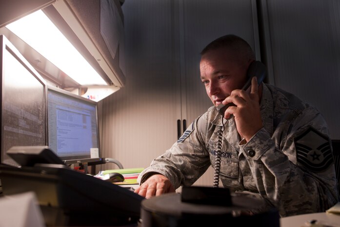 Master Sgt. Bryan Anderson, 99th Medical Group patient advocate, speaks with a patient at the Mike O'Callaghan Federal Medical Center on Nellis Air Force Base, Nev., Sept. 15, 2014. Patient advocates are located in each clinic and at the group level to help patients with any medical concerns they need help alleviating after seeing their provider.  (U.S. Air Force photo by Staff Sgt. Victoria Sneed)