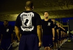 U.S. Air Force Basic Trainees assigned to the 324th Training Squadron, Joint Base San Antonio-Lackland, stand in formation prior to a silent run honoring prisoners of war and those still missing in action, Sept. 20, 2013. (U.S. Air Force photo by Staff Sgt. Vernon Young Jr.)