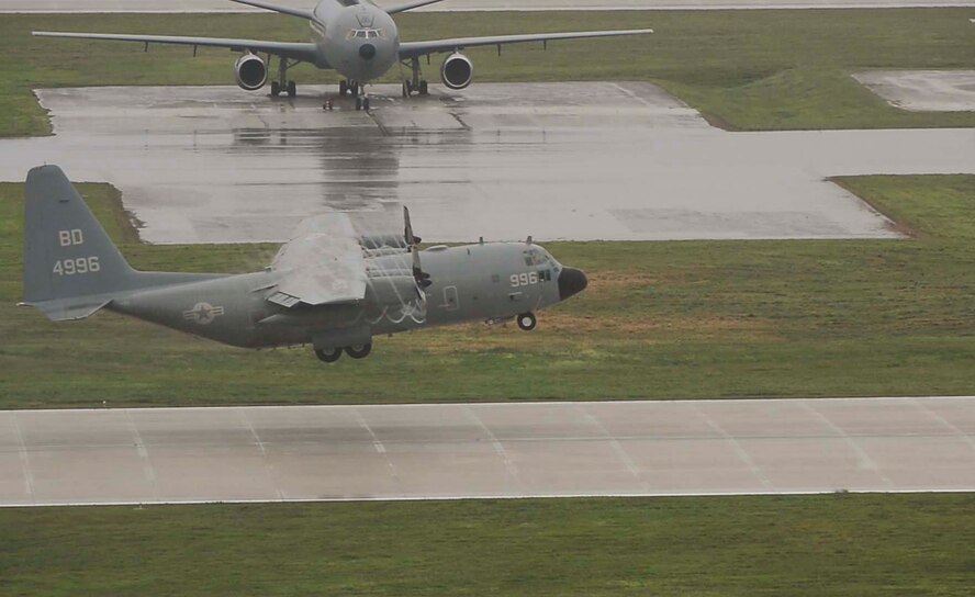 A C-130 takes off during Valiant Shield 2014. Valiant Shield is a U.S.-only exercise integrating U.S. Navy, Air Force, Army and Marine Corps assets, offering real-world joint operational experience to develop capabilities that provide a full range of options to defend U.S. interests and those of its allies and partners. (U.S. Marine Photo by Lance Cpl. Abbey Perria/Released)