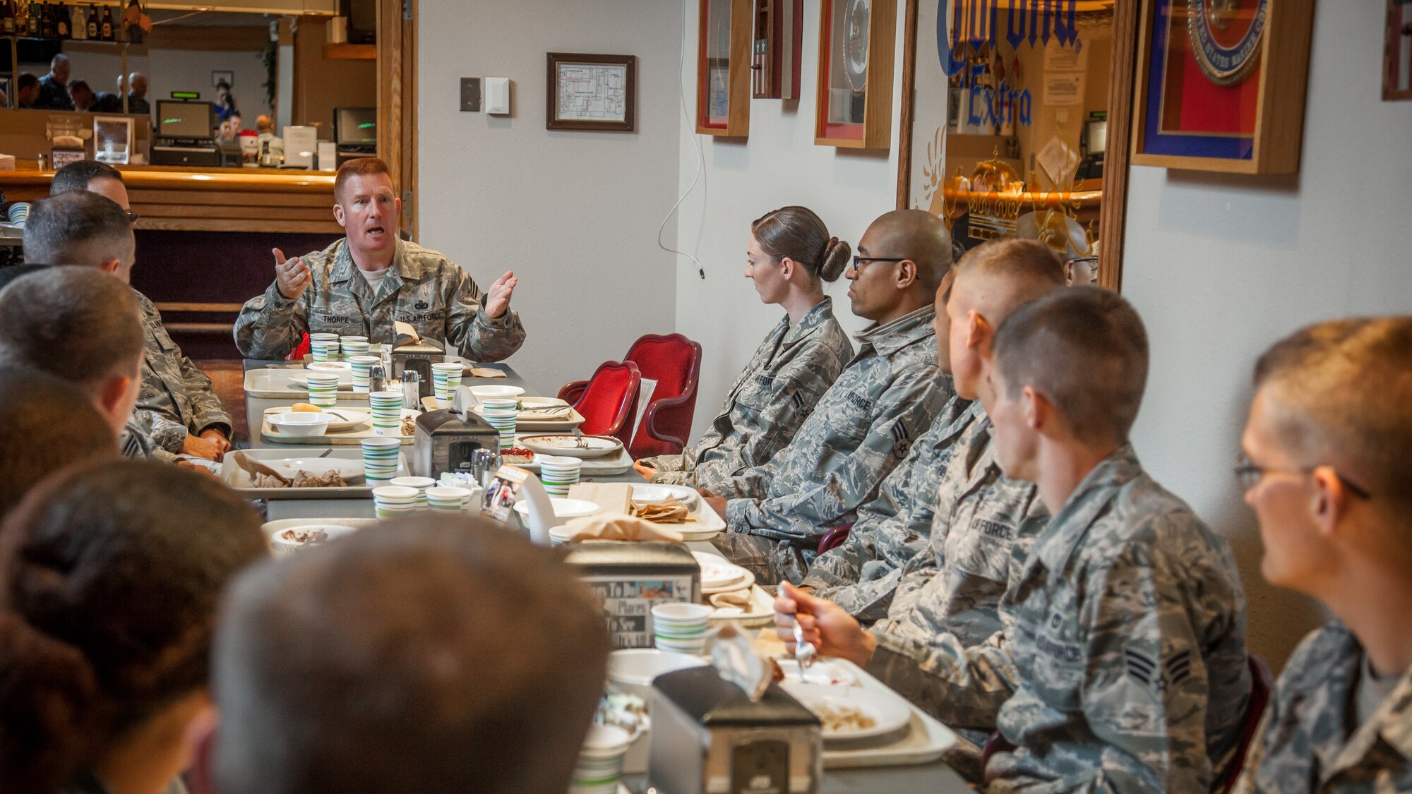 Chief Master Sergeant Michael Thorpe, 22nd Air Force Command Chief, speaks with E1-E4 Airmen during a mentoring lunch at the Services Club durning the September Unit Training Assembly weekend at Minneapolis-St. Paul Air Reserve Station, MInn.  (U.S. AIr Force photo by Shannon McKay/Released)