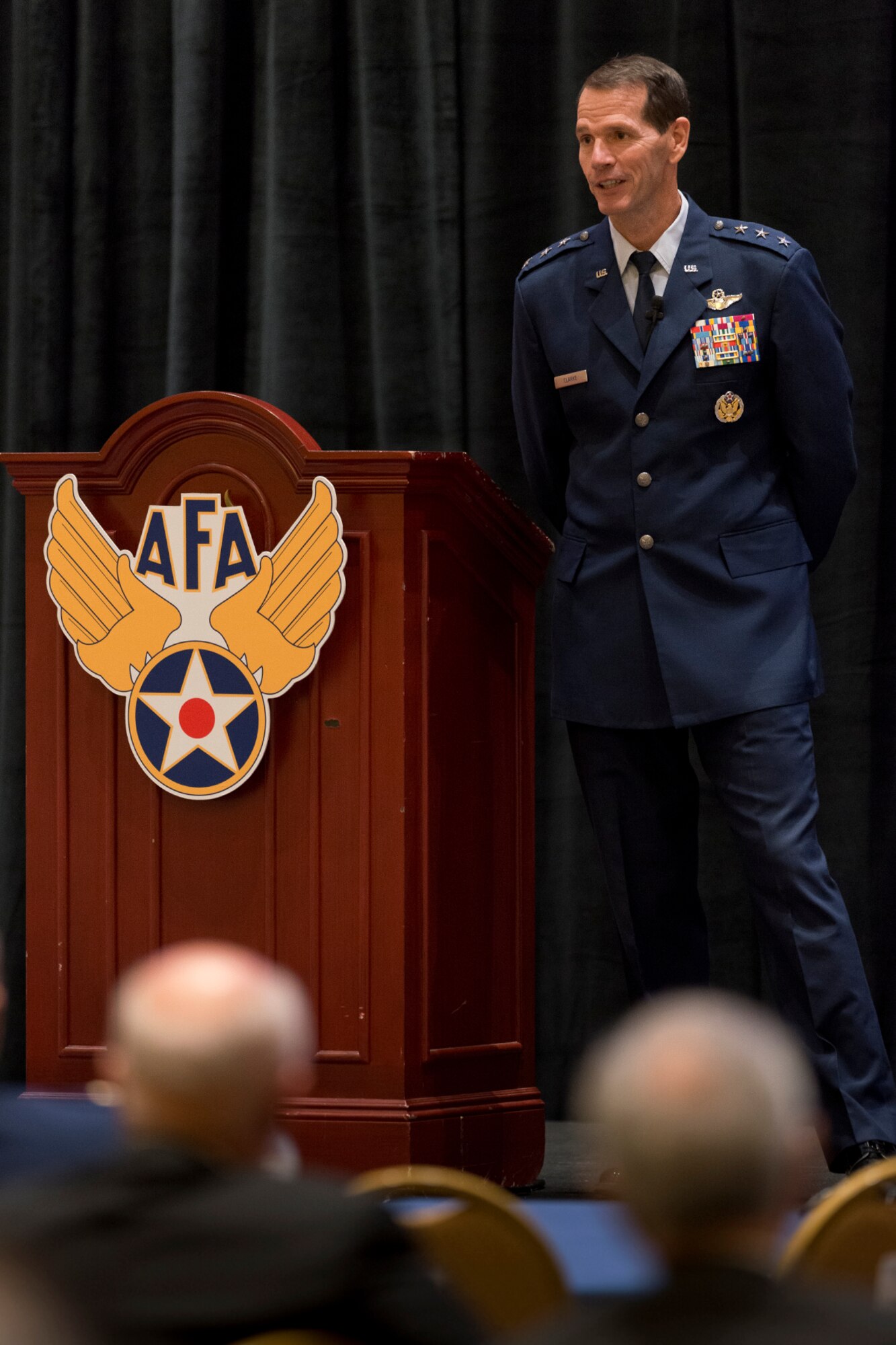 Lt. Gen. Stanley E. Clarke III, director of the Air National Guard addresses an audience during the Air National Guard update at the Air Force Association’s Air and Space Conference and Technology Exposition September 15, 2014 in National Harbor, Maryland. Clarke highlighted the ANG’s involvement in domestic operations and recognized several ANG Airmen and units for exemplary service during recent combat operations. (Air National Guard photo by Master Sgt. Marvin R. Preston/Released)