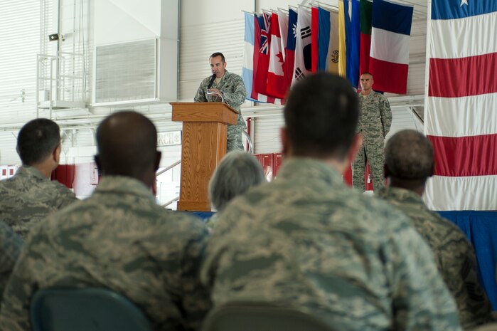 U.S. Air Force Col. Robert Ramsden, 99th Air Base Wing vice commander, welcomes attendees of the Retiree Appreciation Day at Nellis Air Force Base, Nev., Sept. 13, 2014. The annual event is held to recognize the hard work and sacrifices made by military retirees and their families. (U.S. Air Force photo by Senior Airman Timothy Young)