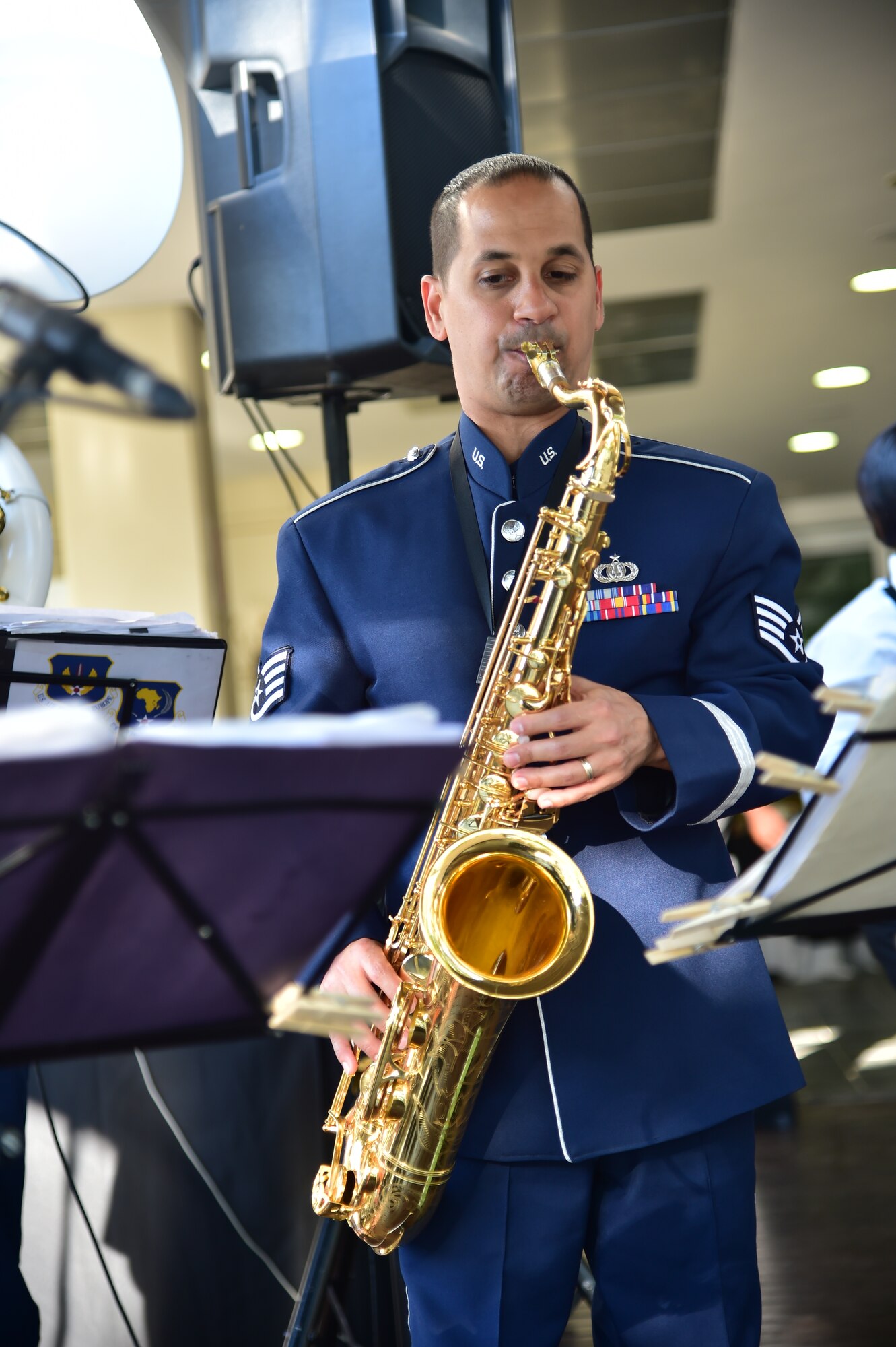 U.S. Air Forces in Europe’s Wings of Dixie jazz band saxophonist Staff. Sgt. Mateo Ayala plays during the U.S, South Africa Border Surveillance Technology Cooperation Symposium Sept.16, 2014, in Pretoria, South Africa. The Wings of Dixie jazz band is scheduled to play many events while in South Africa in support of the Africa Aerospace and Defence Expo 2014. (U.S. Air Force photo/Staff Sgt. Travis Edwards)