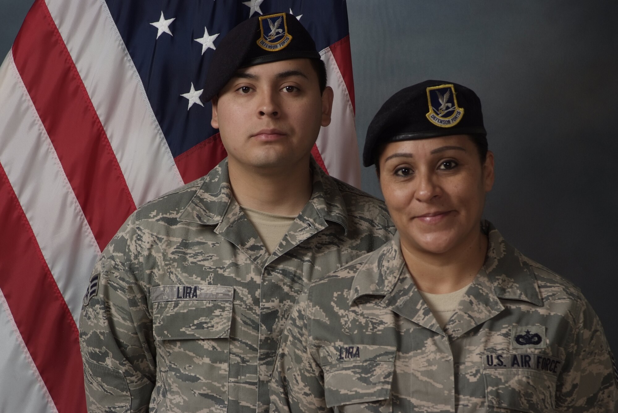 PETERSON AIR FORCE BASE, Colo. —Two defenders in one family, Senior Airman Jonnathan Lira (left), 50th Security Forces Squadron at Schriever Air Force Base and Tech Sgt. Hope Lira (right), 302nd Security Forces Squadron, take pride in their family tradition of military service. (U.S. Air Force courtesy photo)