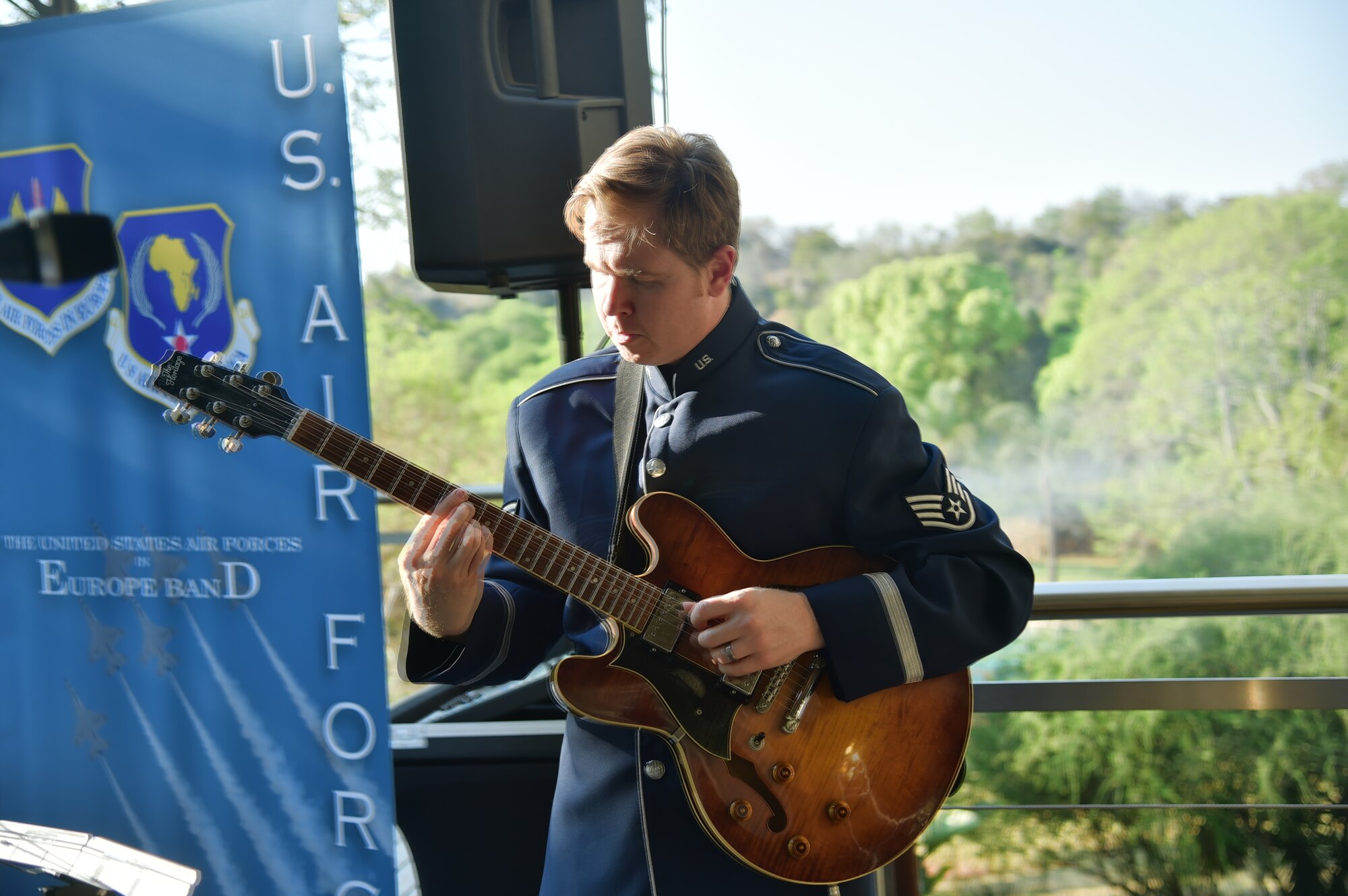 U.S. Air Forces in Europe’s Wings of Dixie jazz band guitarist Staff Sgt. Joseph Gacioch plays during the U.S, South Africa Border Surveillance Technology Cooperation Symposium Sept.16, 2014, in Pretoria, South Africa. The jazz band played two hours of music during the symposium and is scheduled to play many events while in South Africa in support of the Africa Aerospace and Defence Expo 2014. (U.S. Air Force photo/Staff Sgt. Travis Edwards)