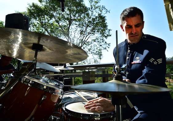 U.S. Air Forces in Europe’s Wings of Dixie jazz band drummer Senior Airman Edward Zaryky plays during the U.S, South Africa Border Surveillance Technology Cooperation Symposium Sept.16, 2014, in Pretoria, South Africa. The Wings of Dixie jazz band is scheduled to play many events while in South Africa in support of the Africa Aerospace and Defence Expo 2014. (U.S. Air Force photo/Staff Sgt. Travis Edwards)
