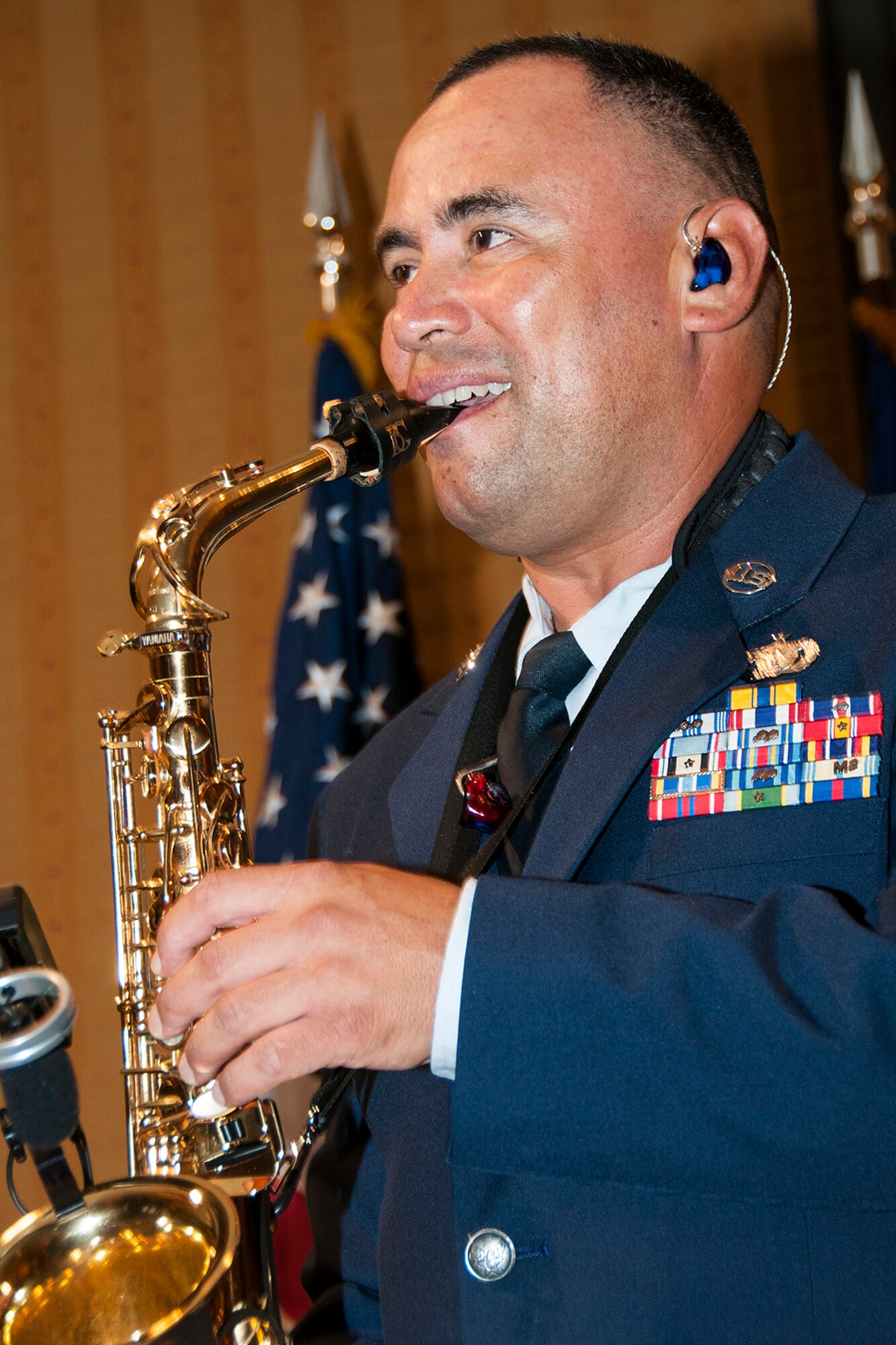 U.S. Air Force Staff Sgt. Johnny Holiday performs during the 307th Bomb Wing's Senior Noncommissioned Officer Ceremony, Sept. 6, 2014, Bossier City, La. Holiday is assigned to the 610th Security Forces Squadron, Carswell Naval Air Station Joint Reserve Base, Fort Worth, Texas, and performs for military members around the world. (U.S. Air Force photo by Tech. Sgt. Ted Daigle/Released)