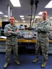 Staff Sgts. Justin Kinder, left, and Nick Buck, 341st Maintenance Operations Squadron electronics laboratory team, pose for a photograph after a training session at Malmstrom Air Force Base Aug. 25. The team is one of nine from the base that will be competing in the 2014 Air Force Global Strike Challenge. (U.S. Air Force photo/Airman 1st Class Collin Schmidt)