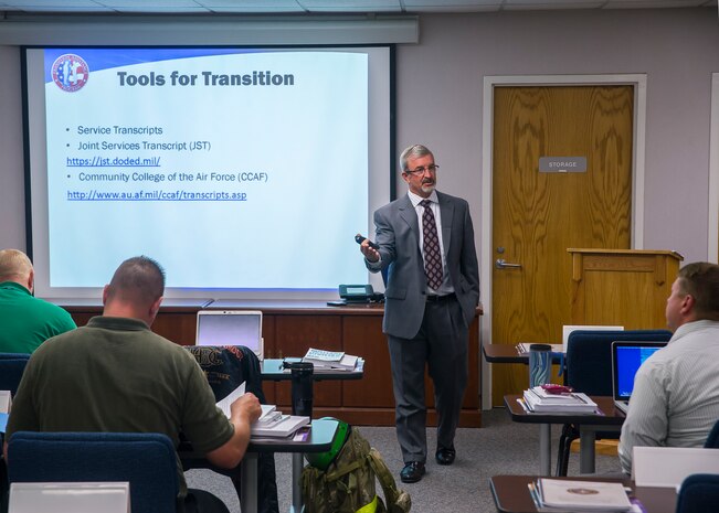Kevin Hawks, transition assistance counselor, leads a class in the Airman and Family Readiness Center, Sept. 15, 2014, at Joint Base Charleston, S.C. The A&FRC on the Air Base, and the FFSC at the Weapons Station, both provide programs to service members from all military branches; active duty, guardsmen or reservists, along with their families and retirees. They also offer office hours at the Naval Nuclear Power Training Command’s Rickover Center to make it easier for Sailors attending school to utilize their services. (U.S. Air Force photo/Staff Sgt. William O'Brien)