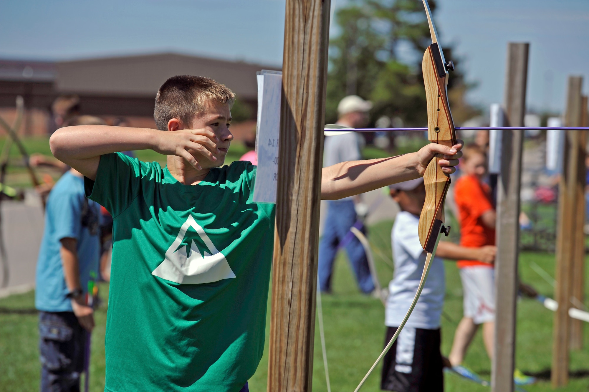 Competitors at the archery range take aim at their targets during an archery tournament at Scott Air Force Base, Ill., Sept. 14, 2014. The event was hosted by Scott AFB Outdoor Recreation and had around two dozen participants. The archery range was rebuilt by an Eagle Scout a few years ago. The archery range at Scott is open from sunrise to sunset. (U.S. Air Force photo by Airman 1st Class Erica Crossen)