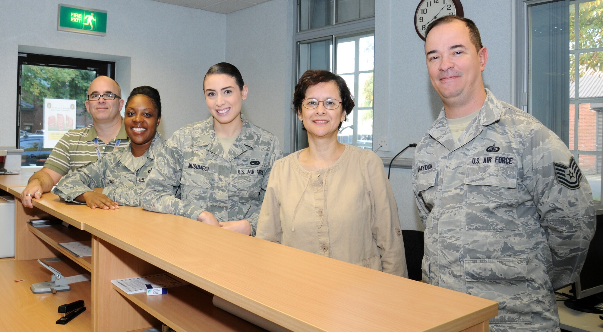 Members of the 100th Logistics Readiness Squadron commander’s support staff pose for a photograph Sept. 9, 2014, on RAF Mildenhall, England. The staff organizes personnel issues for more than 300 Airmen including enlisted performance reports, officer performance reports, awards and decorations. (U.S. Air Force photo/Gina Randall/Released)