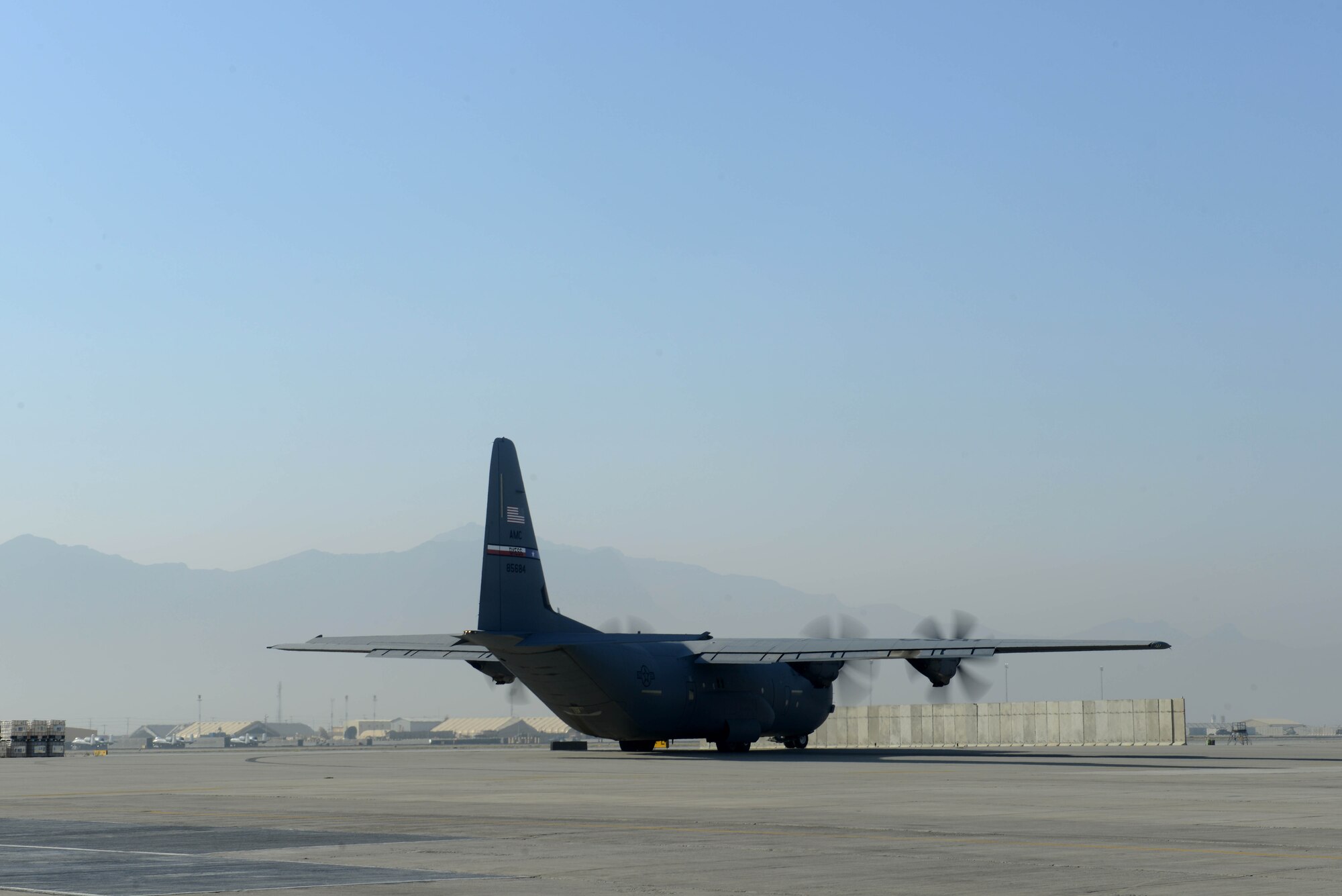 A U.S. Air Force C-130J Super Hercules aircraft with the 774th Expeditionary Airlift Squadron departs Bagram Airfield, Afghanistan Sept. 12, 2014.  The unit redeployed to their home base Dyess Air Force Base, Texas.  The 41st Airlift Squadron from Little Rock, Arkansas replaced the unit. The 774 EAS supported various tactical airlift capabilities including airdrop operations as well as humanitarian efforts and aeromedical evacuation.  (U.S. Air Force photo by Staff Sgt. Evelyn Chavez/Released)
