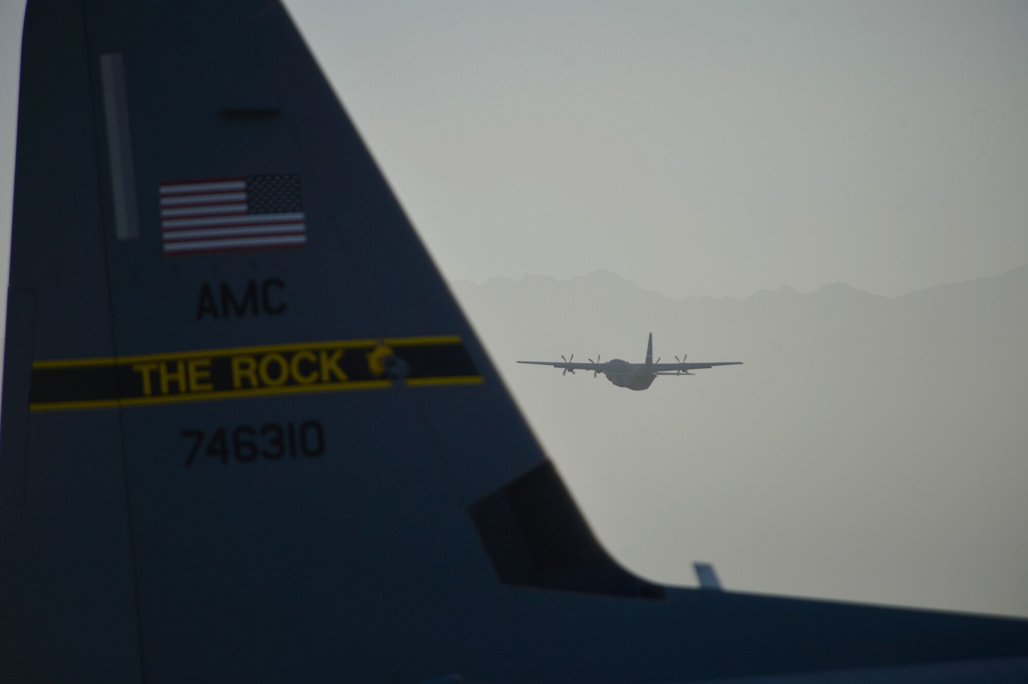 A U.S. Air Force C-130J Super Hercules aircraft with the 774th Expeditionary Airlift Squadron flies out of Bagram Airfield, Afghanistan Sept. 12, 2014.  The unit redeployed to their home base Dyess Air Force Base, Texas.  The 41st Airlift Squadron from Little Rock, Arkansas replaced the unit. The 774 EAS supported various tactical airlift capabilities including airdrop operations as well as humanitarian efforts and aeromedical evacuation.  (U.S. Air Force photo by Staff Sgt. Evelyn Chavez/Released)
