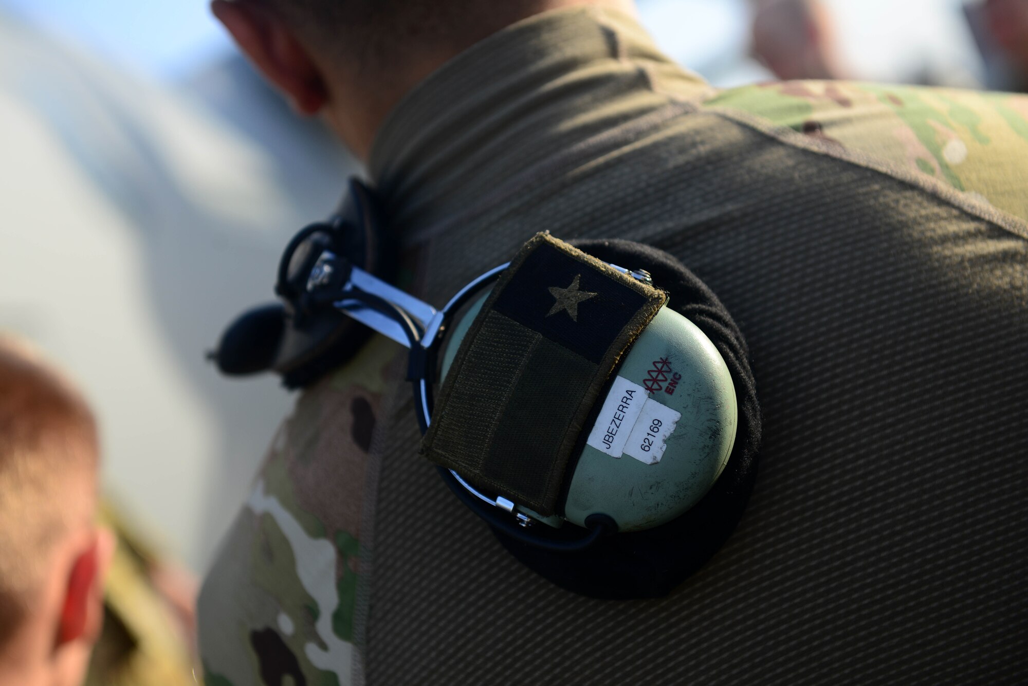 A U.S. Air Force Airman with the 774th Expeditionary Airlift Squadron, listens to the commanders instructions at Bagram Airfield, Afghanistan Sept. 12, 2014.  The unit redeployed to their home base Dyess Air Force Base, Texas.  The 41st Airlift Squadron from Little Rock, Arkansas replaced the unit. The 774 EAS supported various tactical airlift capabilities including airdrop operations as well as humanitarian efforts and aeromedical evacuation.  (U.S. Air Force photo by Staff Sgt. Evelyn Chavez/Released)