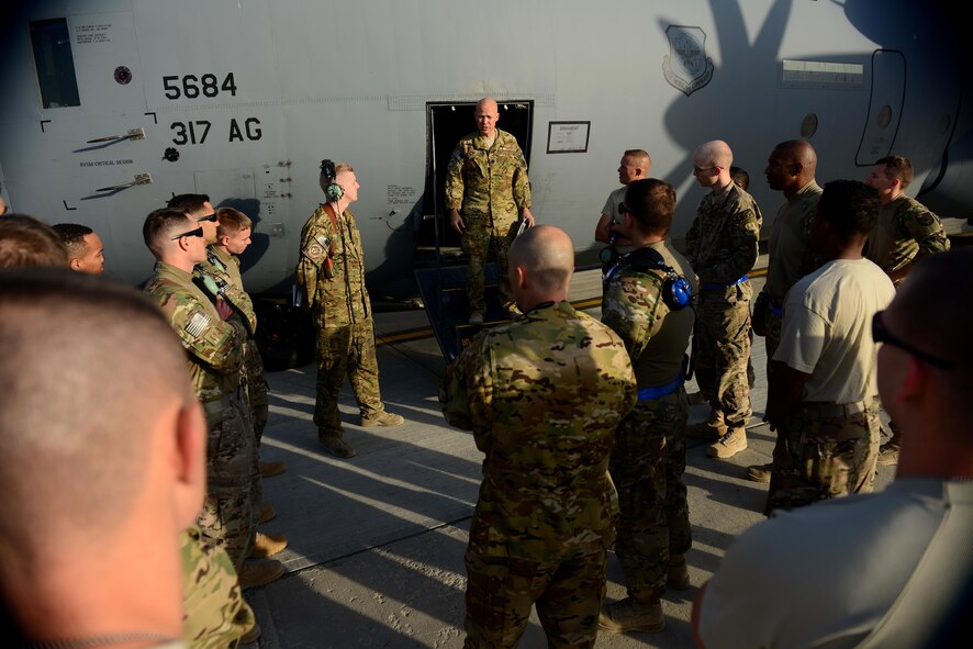 U.S. Air Force Lt. Col. Joseph Miller, 774th Expeditionary Airlift Squadron commander, speaks to Airmen from the squadron at Bagram Airfield, Afghanistan Sept. 12, 2014.  The unit redeployed to their home base Dyess Air Force Base, Texas.  The 41st Airlift Squadron from Little Rock, Arkansas replaced the unit. The 774 EAS supported various tactical airlift capabilities including airdrop operations as well as humanitarian efforts and aeromedical evacuation.  (U.S. Air Force photo by Staff Sgt. Evelyn Chavez/Released)