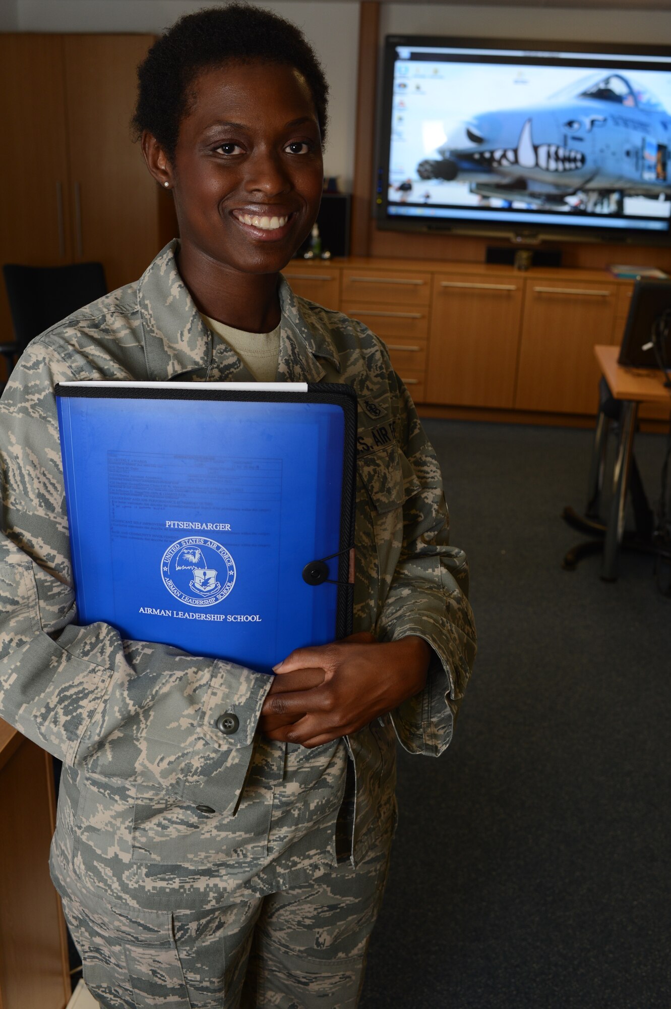 U.S. Air Force Staff Sgt. Iesha Edwards, 52nd Force Support Squadron Airman Leadership School warthog flight instructor from Newport News, VA., is the Super Saber Performer for the week of Sept. 17-23. (U.S. Air Force photo by Senior Airman Gustavo Castillo/Released)