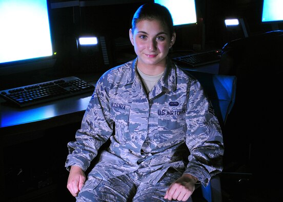 U.S. Air Force Airman 1st Class Katherine Discenza, 35th Communications Squadron cyber transport systems technician, is tasked with working in the network management section of the cyber transport systems career field providing base communication through secured and non-secured internet. She is tasked with maintaining, revitalizing, troubleshooting, upgrading, and deploying network equipment throughout the base. (U.S. Air Force photo by Senior Airman Jose L. Hernandez-Domitilo)