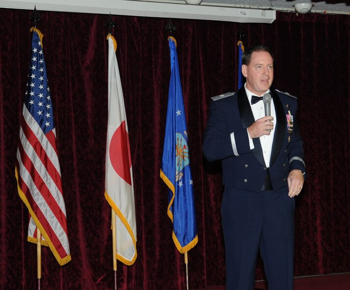 U.S. Air Force Brig. Gen. James Hecker, 18th Wing commander, gives a speech during the 2014 Air Force Ball on Kadena Air Base, Japan, Sept. 13, 2014. Kadena's Air Force ball was held at the NCO Rocker Club and celebrated the Air Force's 67th birthday. (U.S. Air Force photo by Airman 1st Class Zackary A. Henry/Released)