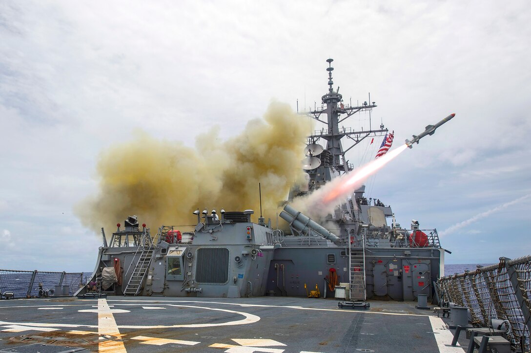 The USS Stethem launches a harpoon missile near Guam, Sept. 15, 2014 ...