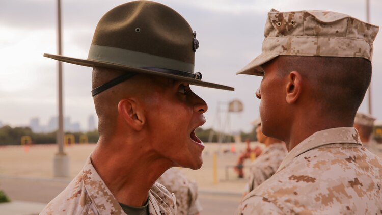 A Recruit of India Company, 3rd Recruit Training Battalion, stands at attention as he is inspected by a drill instructor during the senior drill instructor’s inspection at Marine Corps Recruit Depot San Diego, Sept. 5. Other drill instructors swarmed the platoon creating chaos, testing the recruits’ bearing, one of the Marine Corps leadership traits. 