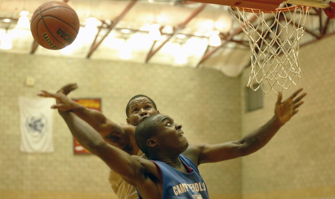 CAMP PENDLETON, Calif. - The 1st Medical Battalion beat the 1st Combat Engineer Battalion 44-34 at the Paige Fieldhouse basketball court, Sept. 16. 1st Med. Bn. is ranked sixth overall and 1st CEB is ranked fifth over all. The top eight teams will advance to the play offs starting next week. (Photo by Cpl. Keenan Zelazoski)