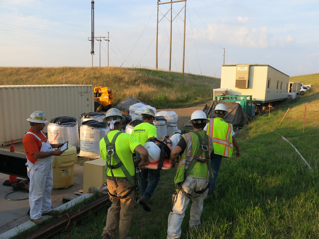 Each crew member was given a duty they are responsible for performing during the rescue drill. One employee is to call 911 and drive to the stop sign at the end of the road. This employee then waits for emergency personnel and assists with directing them into the jobsite.