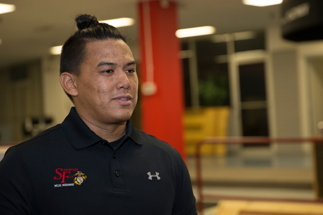 Randy Saldivar, a Return-to-Readiness program trainer, watches over a group during a lunch-time physical training session at the High Intensity Tactical Training Center aboard Marine Corps Air Station Miramar, Calif., Sept. 8. Saldivar helps injured Service members get back to full duty once their physical therapy sessions are complete.