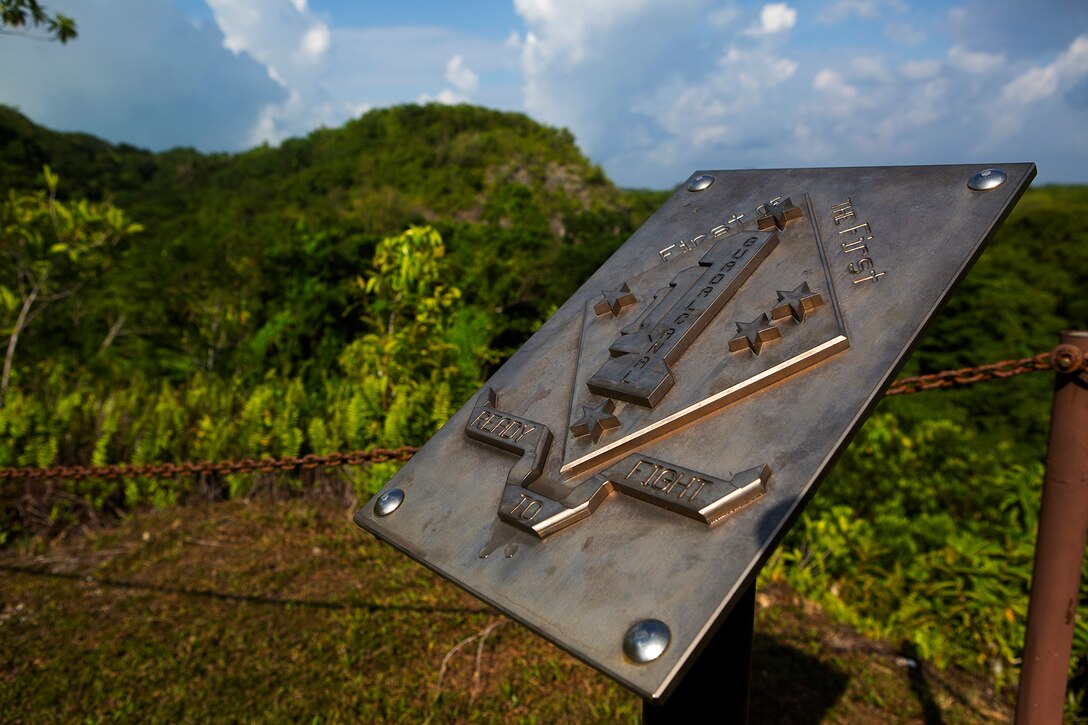 A plaque dedicated to the 1st Marine Division sits atop Bloody Nose Ridge at the 1st Marine Division Memorial on the Island of Peleliu, Palau, Sept. 15. This year marks the 70th Anniversary of the landing on Peleliu, in which Marines from the 1st Marine Division fought in and was one of the bloodiest battles during World War II in the Pacific.