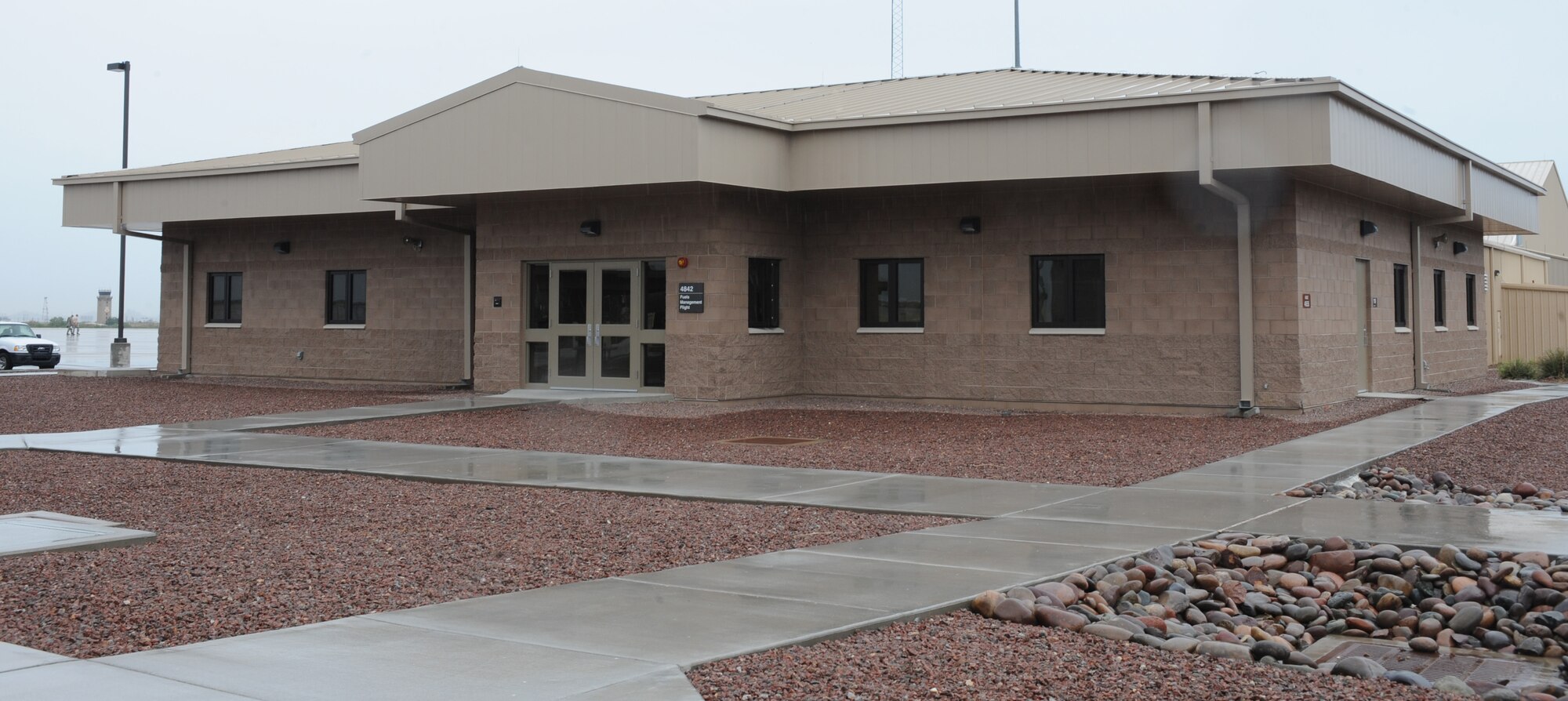 The new Fuels Management Facility stands at Davis-Monthan Air Force Base, Ariz., Sept. 17, 2014. The building houses fuels management as well as the fuels testing laboratory. The mission of the Fuels Flight is to provide clean, dry fuel to the flight line in a timely manner. (U.S. Air Force photo by Airman 1st Class Cheyenne Morigeau/Released)