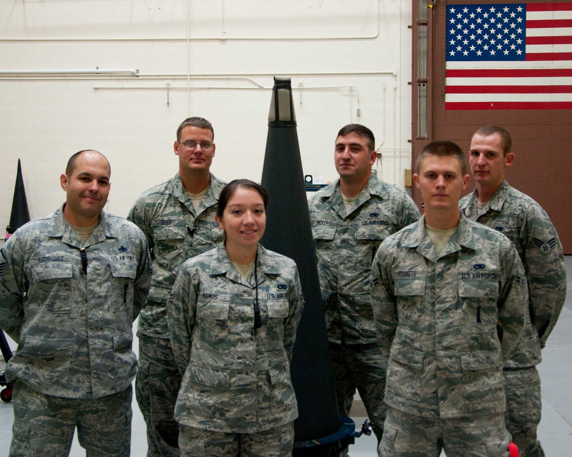 The 90th Munitions Squadron team for the 2014 Global Strike Challenge: Master Sgt. Adam Rodriguez, Staff Sgt. Jon Beier, Airman 1st Class Eunice Ramos, Staff Sgt. Kirk Wickey, Airman 1st Class John Stuedte and Senior Airman Elijah Miller. (U.S. Air Force photo by Senior Airman Jason Wiese)