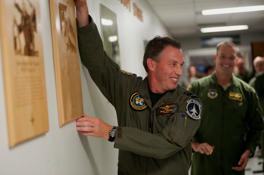 The 'ENJJPT Star' is awarded to Royal Netherlands F-16 pilot, Col. Peter 'Wobble' Tankink at Sheppard Air Force Base, Texas. This is the third honor for a Euro-NATO Joint Jet Pilot Training Program graduate in the program's 30 year history. The award recognizes extraordinary aviation moments.  For Tankink, it was his first shoot-first kill downing of a MiG-29 during Operation Allied Forces Kosovo in 1999. He shared the experience with a standing-room-only crowd of undergraduate pilots and instructors Sep. 15. (U.S. Photo/Airman First Class Jelani Gibson)