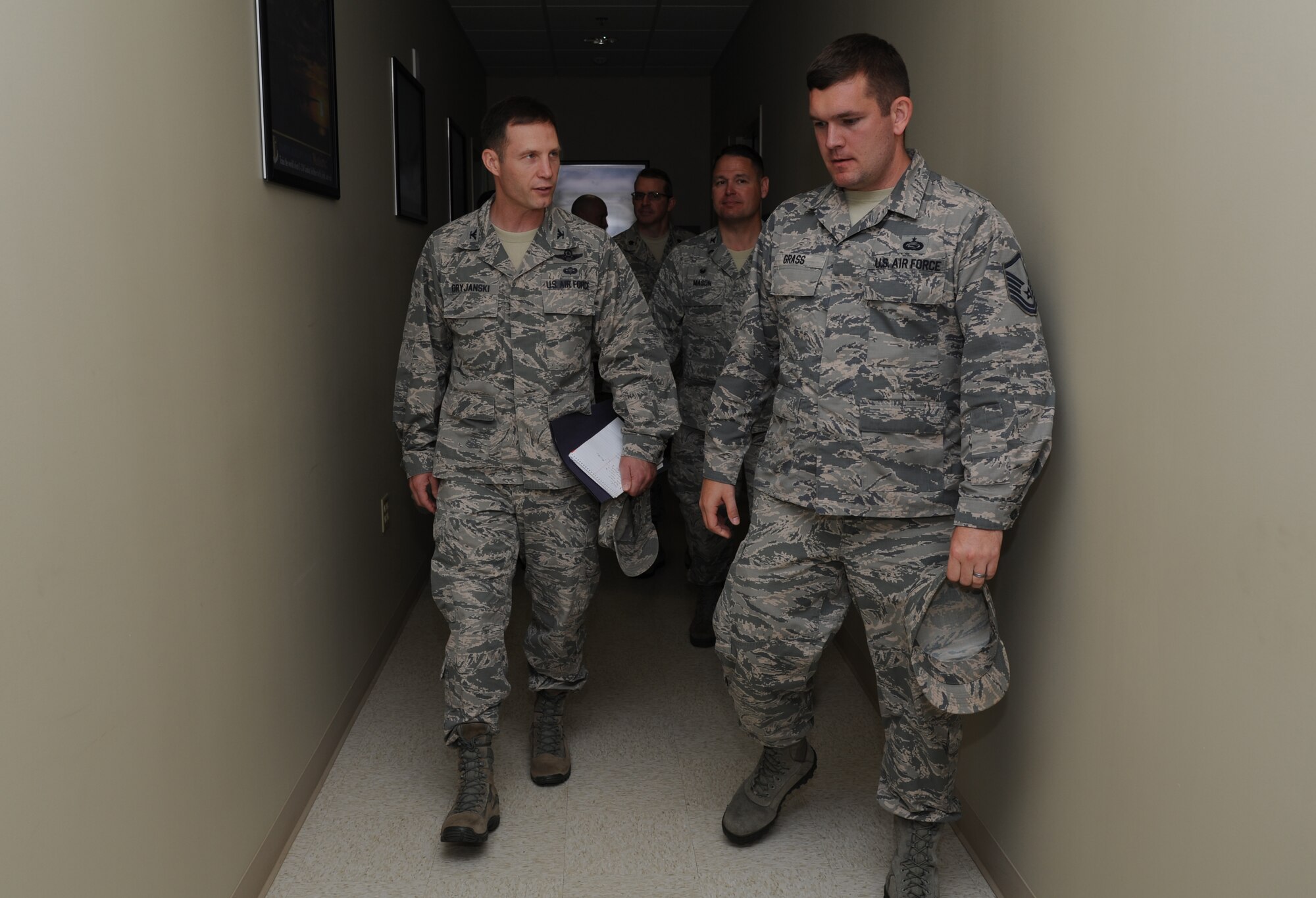 Col. James Dryjanski, 314th Airlift Wing commander, walks through the 314th Maintenance Group August 14, 2014, at Little Rock Air Force Base, Ark. Dryjanski toured the 314th MXG to familiarize himself with group operations and meet with the Airmen who support the combat airlift mission. (U.S. Air Force photo by Airman 1st Class Mercedes Muro) 