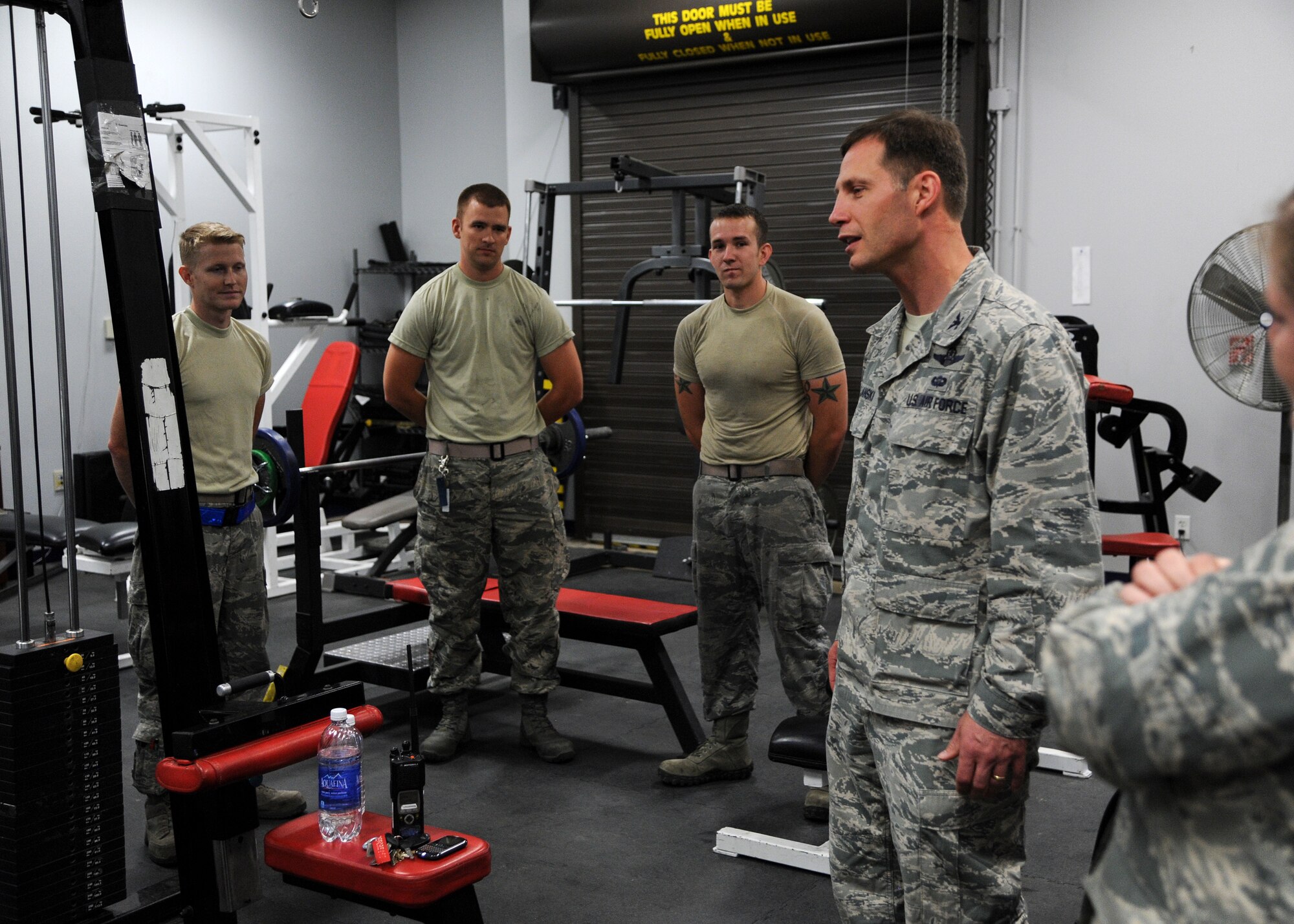 Col. James Dryjanski, 314th Airlift Wing commander, visits the 48th Airlift Squadron’s fitness center August 14, 2014, at Little Rock Air Force Base, Ark. Dryjanski visited different squadrons within the 314th AW, informing Airmen of their importance to the combat airlift mission. (U.S. Air Force photo by Airman 1st Class Cliffton Dolezal)