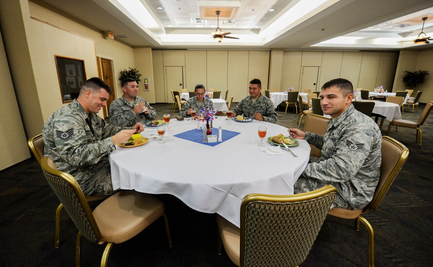 Airmen from the 23d Equipment Maintenance Squadron gather for a meal during the Air Force Birthday Lunch Buffet Sept. 18, 2014 at Moody Air Force Base, Ga. The lunch was one of several events the base hosted to celebrate the Air Force’s 67th birthday. (U.S. Air Force photo by Airman 1st Class Sandra Marrero/Released)

