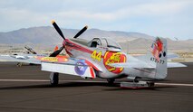 A vintage P-51 Mustang fighter aircraft is parked at Stead Airport, Reno, Nev., Sept. 13, 2014. The air races were held Sept. 10-14. (U.S. Air Force photo by Staff Sgt. Robert M. Trujillo/Released)