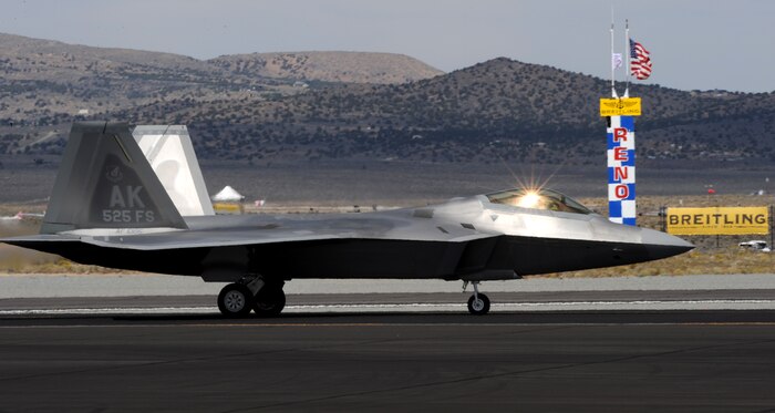 A F-22 Raptor prepares to take-off during the National Championship Air Races in Reno, Nev., Sept. 13, 2014. The Raptor is powered by two Pratt & Whitney F119-PW-100 turbofan engines with afterburners and two-dimensional thrust vectoring nozzles. (U.S. Air Force photo by Staff Sgt. Robert M. Trujillo/Released)
