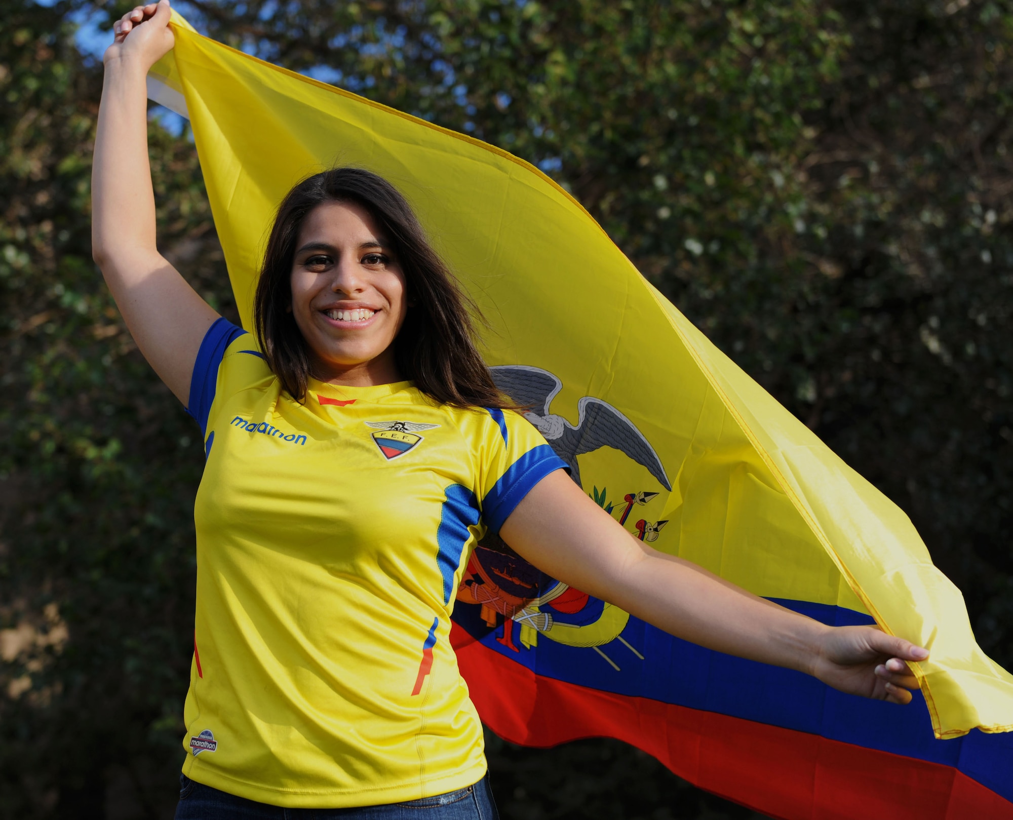Airman Allison Campoverde, 22nd Medical Support Squadron medical records technician, poses with an Ecuadorian flag, Sept. 13, 2014, at McConnell Air Force Base, Kan. Campoverde showed her support for her native country in recognition of Hispanic Heritage Month which began Sept. 15 and ends Oct. 15. (U.S. Air Force photo/Airman 1st Class Tara Fadenrecht)