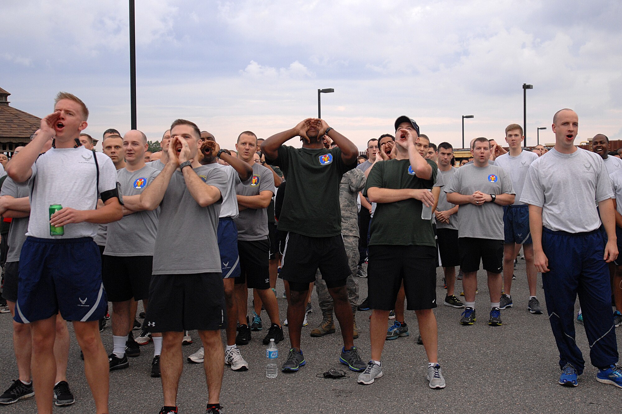U.S. Air Force Airmen sounds off before the 2014 480th Intelligence, Surveillance and Reconnaissance Wing Warrior Challenge at Langley Air Force Base, Sept. 17, 2014. The Airmen were encouraged to display showmanship and morale during the warrior challenge. (U.S. Air Force photo by Airman 1st Class Breonna Veal)