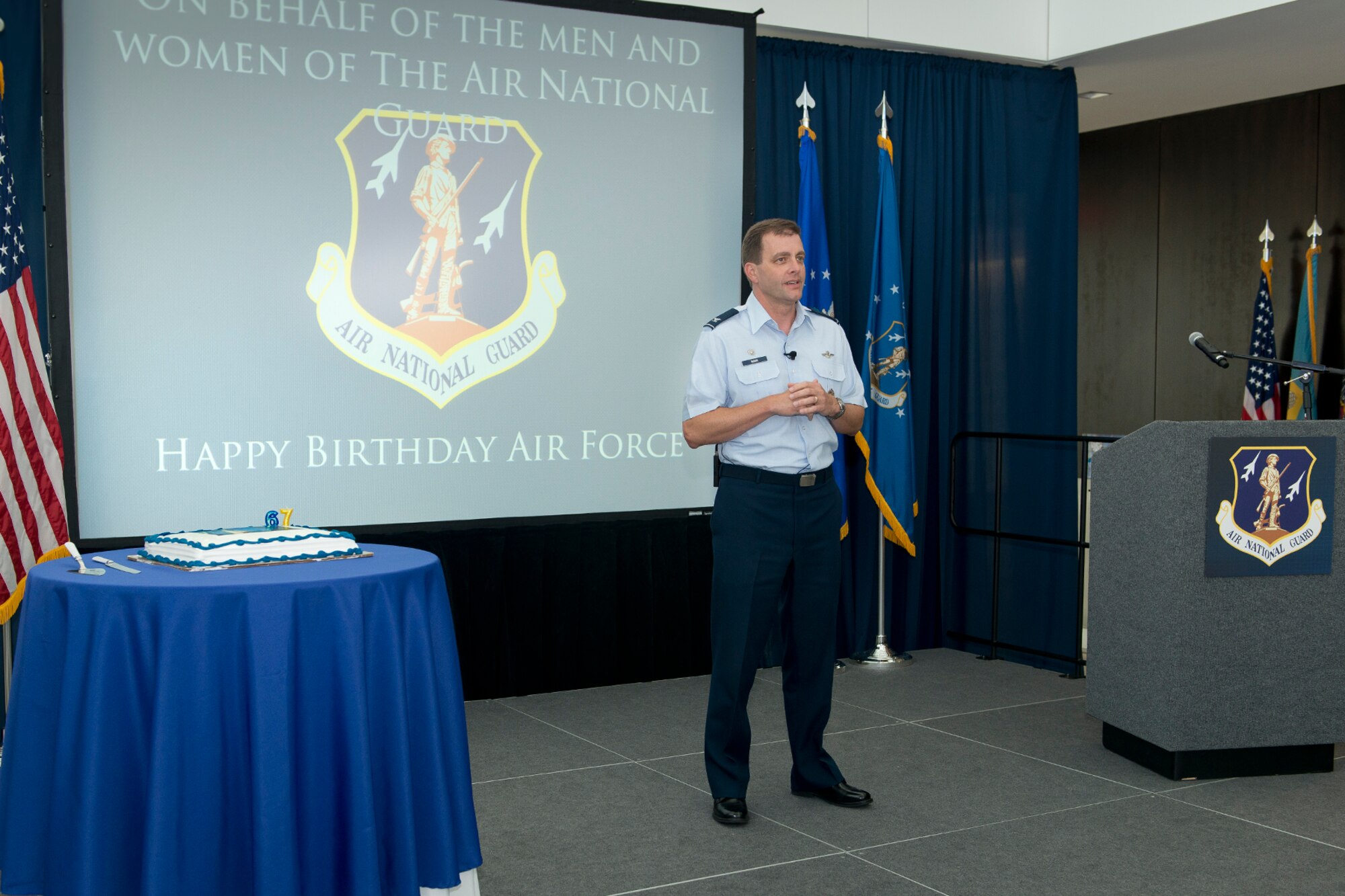 Col. Eric W. Mann, vice commander of the Air National Guard Readiness Center, Joint Base Andrews, Md., addresses airmen during a ceremony recognizing the 67th birthday of the United States Air Force, Sept. 18, 2014. In 1947, the National Security Act turned what was then known as the Army Air Corps into the Department of the Air Force. Today’s Air Force is comprised of more than 680,000 Airmen, made up of active duty, reservists, guardsmen and civilians, who support more than 5,600 aircraft, 450 intercontinental ballistic missiles and 63 satellites. Today's Air Force is the world's preeminent air, space and cyberspace force with an ability to rapidly adapt to uncertainty, ensuring future success. (Air National Guard photo by Master Sgt. Marvin R. Preston/Released)