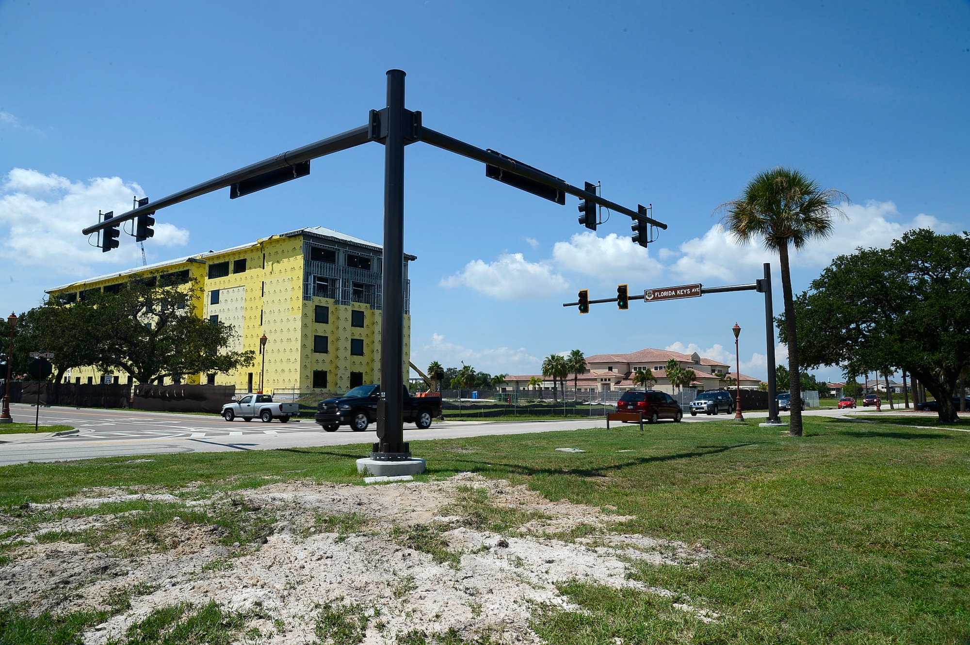 A new traffic light was place at the intersection of Florida Keys Avenue and Bayshore Boulevard at MacDill Air Force Base, Fla., Sept. 18, 2014. The traffic light will alleviate traffic congestion when the five-story visiting quarters and Joint Special Operation University are operational. (U.S. Air Force photo by Airman 1st Class Tori Schultz/Released)
