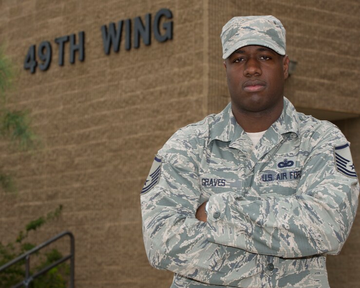 Master Sgt. Robert M. Graves, 49th Wing superintendent, originally from Akron, Ohio, joined the Air Force in 2000 for the chance and privilege to work with a diverse group of individuals from different backgrounds. “The Air Force Birthday is just one day out of the year that we get to celebrate our core values and show the world the professionalism and pride in what we do,” said Graves. On September 18, 1947 the U.S. Air Force was officially recognized as an independent military service, leaving behind its former role, the U.S. Army Air Corps. This year marks 67 years of the USAF leading the world in air superiority, space and cyberspace. “The future of our nation is forever bound up in the development of Air Power,” Brigadier General Billy Mitchell, United States Army Air Service. (U.S. Air Force photo by Staff Sgt. E’Lysia Wray/ Released)